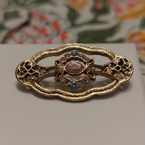 Elegant Gold and Pink Brooch